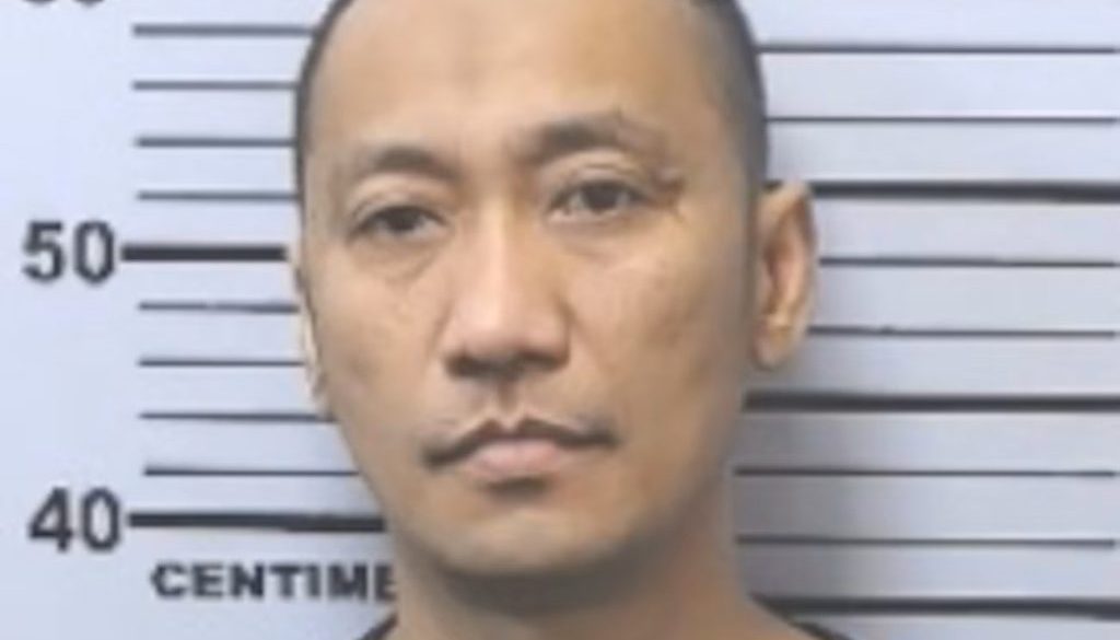 Police Arrest Man Driving Stolen Vehicle at Mobile Police Precinct