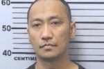 Police Arrest Man Driving Stolen Vehicle at Mobile Police Precinct